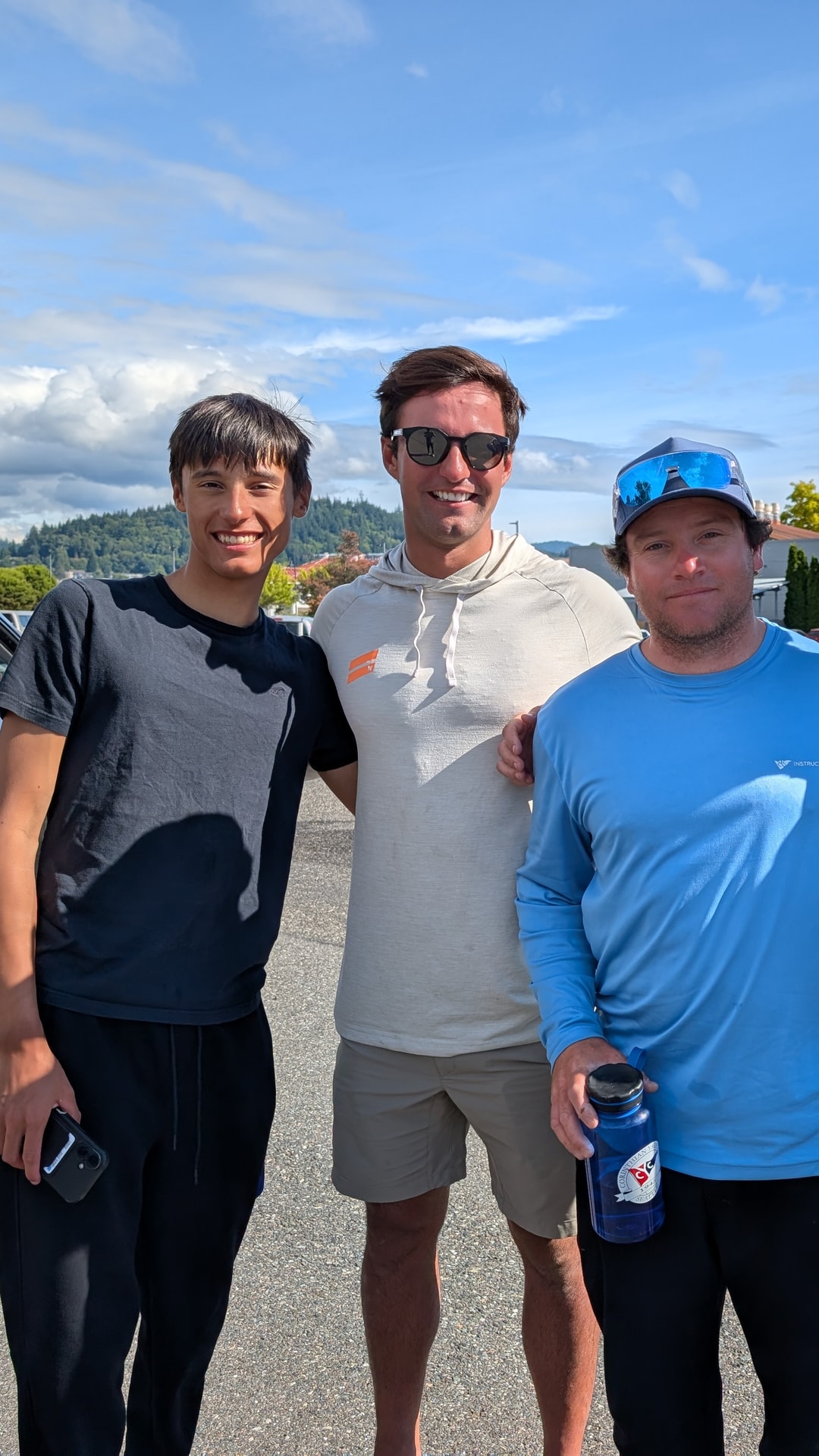 A group of 3 coaches and our ILCA sailor Sebastian to the left.